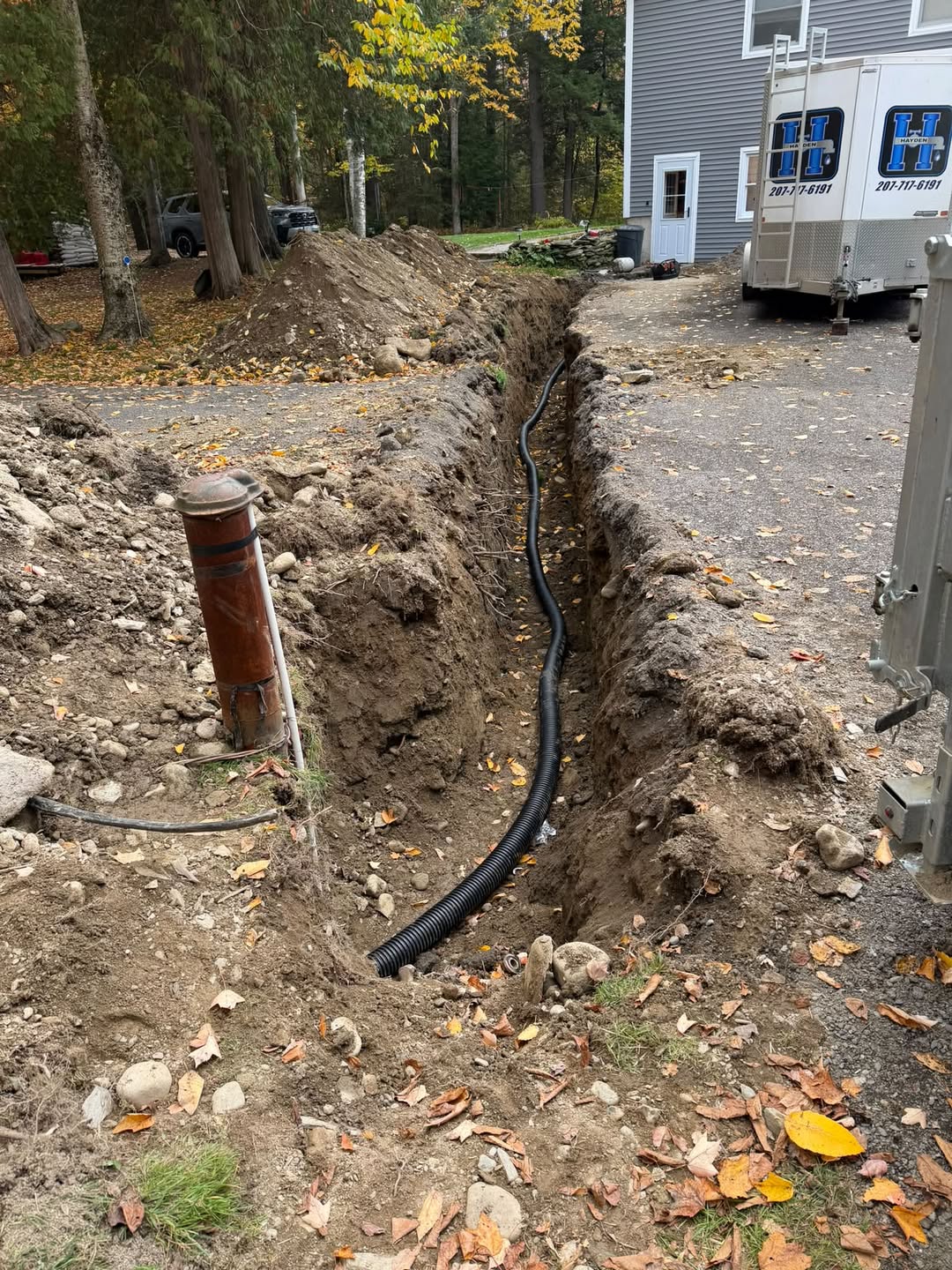 Water line installation at a Maine home